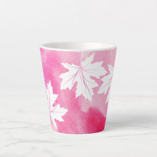 Moderne rosa Aquarellfarben und Blätter aus weißem Milchtasse