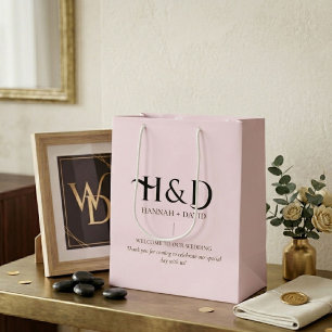 Moderne rosa Monogramm-Hochzeitsbegrüßung für Gäst Mittlere Geschenktüte