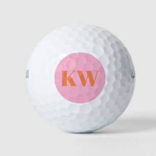 Moderne rosa orangefarbene Monogramm-Initialen Per Golfball