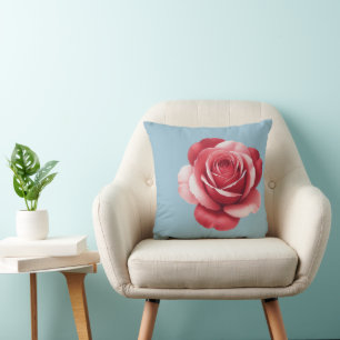 Moderne rote Wurfkissen mit Rose auf kräftigem Bla Kissen