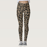 Moderne schwarz-goldgekrackte Muster-Leggings