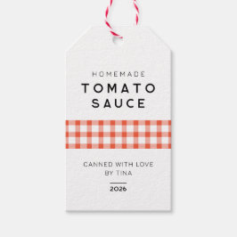 Moderne selbstgemachte Tomatensauce mit kariertem Geschenkanhänger