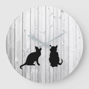Moderne Silhouetten der schwarzen Katzen auf Große Wanduhr
