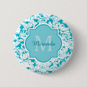 Moderne türkisfarbene florale Girlanongram mit Nam Button