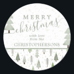 Moderne Weihnachtsbäume MERRY CHRISTMAS Skript Runder Aufkleber<br><div class="desc">Moderne abstrakte Weihnachtsbäume,  Waldbäume und Winterschneemuster in Oliven- und Salbei-Grün-Schattierungen mit dem Gruß MERRY CHRISTMAS und personalisiert mit Ihrem Namen oder Sondertext. Kontaktieren Sie den Designer über den Zazzle Chat oder makeitaboutyoustore@gmail.com ,  wenn Sie dieses Design modifizieren möchten,  ein anderes Produkt erwerben möchten oder gerne Artikel koordinieren möchten.</div>
