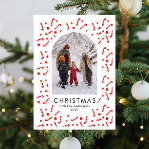 Moderne Weihnachtsgrüße mit Zuckerstangenbogen für Feiertagskarte