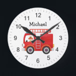 Moderner Personalisierter Name für den Rotfeuerzug Runde Wanduhr<br><div class="desc">Diese personalisierte Kaminuhr ist die perfekte Ergänzung zu Kinderzimmern oder Spielzimmern. Das kühne rote Design und der individuelle Name machen es zu einer lustigen und auffälligen Art, den Zeitverlauf behalten. Kinder werden Liebe sehen, wie ihr Name auf dieser klassischen Feuerwehrautouhr inspiriert wird. Und die Eltern schätzen den stabilen Metallrahmen und...</div>