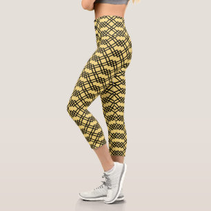 Modernes Gitter Geometrisches Schwarz und Butterge Capri Leggings