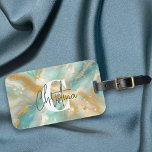 Modernes Glam Luxus Aquamarine Marbella Gold Glitz Gepäckanhänger<br><div class="desc">Dieses individuell gestaltbare Gepäckanhänger verbindet Funktionalität und Eleganz nahtlos. Die Einrichtung ist aus faszinierendem aquamarinischem Marmor, der die ruhigen Tiefen des Ozeanwassers widerspiegelt. Die wirbelnden Venen und die komplizierten Muster schaffen ein Gefühl von Bewegung und Tiefe. Inbegriffen mit dem Marmor, schimmernde goldene Glitzer-Venen und zarte Wirbel fügen eine Touch der...</div>