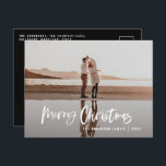 Modernes Minimal-Foto-Schwarzes Drehbuch Weihnacht Feiertagspostkarte<br><div class="desc">Budget Frohe Weihnachten moderne 1 Foto Weihnachtskarte. Modernes Schwarz-Weiß-Design für Ferien. Skripttext mit einem modernen Rand. Handgemalte Polka dot spotty backer. Ändern Sie die Hintergrundfarbe,  um sie anzupassen.</div>