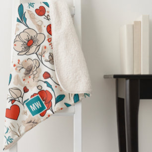 Modernes, minimalistisches Blumenmotiv mit beigem Sherpadecke