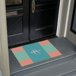 Modernes Monogramm der Aquamarinen, blauen und kor Fußmatte