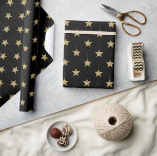 Modernes schwarzes Muster mit goldenen Sternen Geschenkpapier