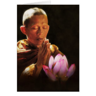 Moine bouddhiste en prière et Lotus