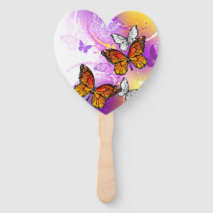 Monarch Butterflies on Purple Background Fächer