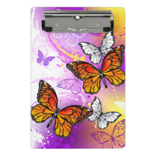 Monarch Butterflies on Purple Background Mini Klemmbrett