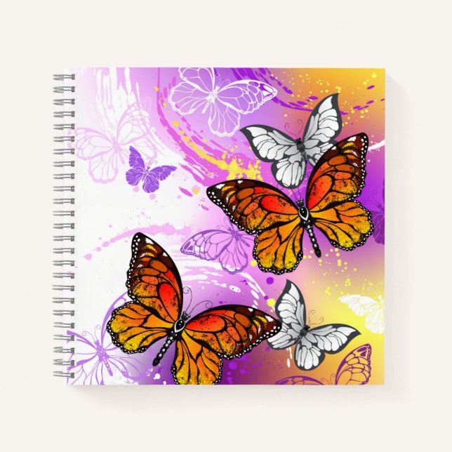 Monarch Butterflies on Purple Background Notizbuch (Vorderseite)