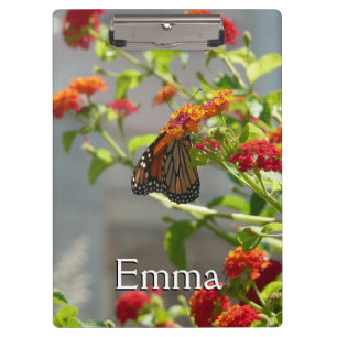 Monarch Butterfly über den Roten Schmetterling Bus Klemmbrett
