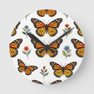 Monarchfalter-Blumenmuster Runde Wanduhr