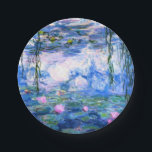 Monet Pink Water Lilies Pappteller<br><div class="desc">Monet rosa Wasserlililis, 12 cm große Teller mit wunderschönen rosa Seerosen, die in einem ruhigen, blauen Teich mit Lilienpolstern schwimmen. Ein großartiges Monet-Geschenk für die Liebhaber von Impressionismus und französischer Kunst.</div>