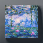 Monet Water Lilies Fotoplatte<br><div class="desc">Monet Water Lilies. Oil painting on canvas from 1916. Monet painted his famous water lily pond obsessively during the final years of his career, drawing inspiration from the light of the sun and its shifting effect on the water and the aquatic flowers and foliage. This painting feature a vibrant use...</div>