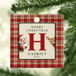 Monogram Christmas Santa Foto Tree Keramikornament<br><div class="desc">Investieren Sie in mehr als nur die Dekoration dieser festlichen Saison mit unseren bezaubernden Monogramm-Baum-Ornamenten. Sie sind mit einer nostalgischen Mischung aus kariertem Weihnachtsmann und seinen winzigen Rentieren gestaltet und bilden persönliche Elemente wie den Namen Ihres Kindes und das Foto Ihrer Familie. Diese Ornamente, die Ihre Feierlichkeiten bereichern, werden zu...</div>