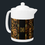 Monogram Metallic Gold und Black Damask<br><div class="desc">Teekanne. Mit einem schönen Monogram Metallic Gold und Black Damask Muster. Ein charmanter Akzent, um Ihre Zuhause zu ergänzen oder um ein Hauswärmeschenk zu geben. 📌 Wenn Sie weitere Anpassungen benötigen, klicken Sie bitte auf den Button "Weitere Anpassungen vornehmen" oder "Design anpassen oder bearbeiten" und verwenden Sie unser Designwerkzeug, um...</div>