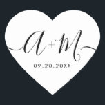 Monogram Script Custom Wedding date Heart Herz-Aufkleber<br><div class="desc">Elevate your wedding details with the Minimalist Monogram Script Custom Wedding Date Heart shaped Sticker (see other shapes). This elegant and personalized sticker adds a touch of sophistication to your wedding stationery, allowing you to showcase your monogram and wedding date in a simple yet impactful way. The sticker features a...</div>