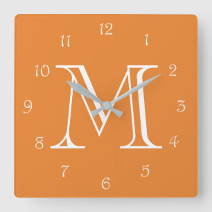 Monogram White Script Numbers On Orange wccn Quadratische Wanduhr