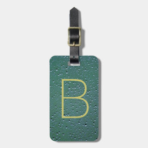 Monogramm auf Regentropfen Textur Gepäckanhänger