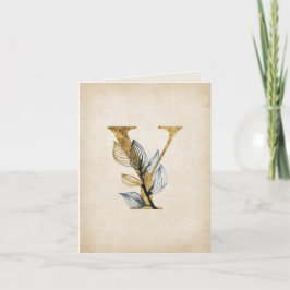 Monogramm aus Gold und Schwarz mit Blätter