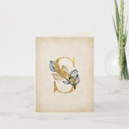 Monogramm aus Gold und Schwarz mit Blätter