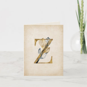Monogramm aus Gold und Schwarz mit Blätter