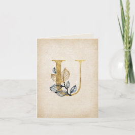 Monogramm aus Gold und schwarz U mit Blätter