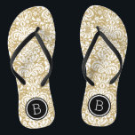 Monogramm aus Gold und schwarzem Floral Flip Flops<br><div class="desc">Maßgeschneiderte,  bedruckte Flop-Sandalen mit einem eleganten,  floralen Damastmuster und einem eigenen Monogramm oder einem anderen Text in einem Kreissaal. Klicken Sie auf Anpassen,  um Schriftart und Farben zu ändern oder eigene Bilder hinzuzufügen,  um ein einzigartiges Design zu erstellen!</div>