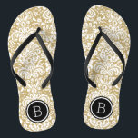 Monogramm aus Gold und schwarzem Floral Flip Flops<br><div class="desc">Maßgeschneiderte,  bedruckte Flop-Sandalen mit einem eleganten,  floralen Damastmuster und einem eigenen Monogramm oder einem anderen Text in einem Kreissaal. Klicken Sie auf Anpassen,  um Schriftart und Farben zu ändern oder eigene Bilder hinzuzufügen,  um ein einzigartiges Design zu erstellen!</div>