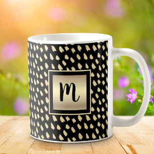 Monogramm aus schwarzem Gold - ein modernes Luxus- Kaffeetasse