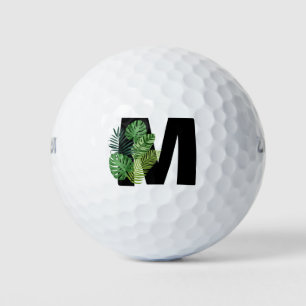 Monogramm der grünen tropischen Blätter m Golfball