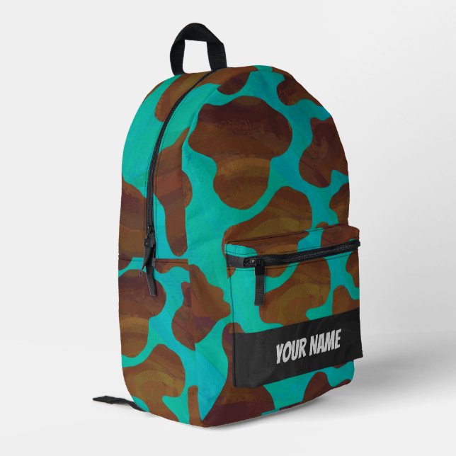 Monogramm für braune und Aquamarine Kuhmuster Bedruckter Rucksack (Rückseitige Ecke links)