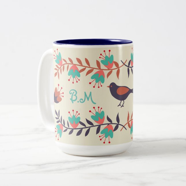 Monogramm für niedliche Vögel und BlumenFolkloreen Zweifarbige Tasse (Vorderseite Links)