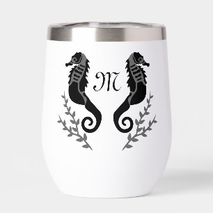 Monogramm für Silhouetten aus schwarzem Seepferd