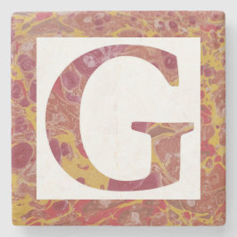 Monogramm G aus rotem und gelbem Stein Steinuntersetzer
