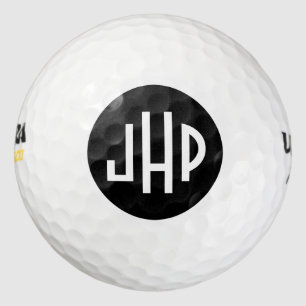Monogramm in weiß auf schwarzem Kreis Golfball