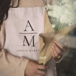 Monogramm Pink Personalisierte Schürze<br><div class="desc">Kochen Sie stilvoll mit dieser Monogram Pink Personalisierte Schürze. Diese Schürze mit einem eleganten rosa Design und einem anpassbaren Monogramm verleiht jeder Küche eine Touch von Eleganz. Er ist aus langlebigen und hochwertigen Materialien gefertigt und bietet Komfort und Schutz. Er eignet sich sowohl für Amateure als auch für berufliche Koch....</div>
