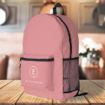 Monogramm Rose Pink Feminine Girly Minimal Bedruckter Rucksack<br><div class="desc">Ein einfaches Monogramm-Design mit moderner Typografie in Weiß auf einem rot-rosa Hintergrund. Das Design besteht aus einem Single-Initial-Monogramm mit minimalistischem Rundkreisrand. Der Text kann leicht an den Anzug Ihrer Bedürfnisse für das perfekt angepasste Geschenk- oder Schreibwarenzubehör angepasst werden!</div>