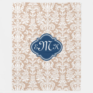 Monogramm-Tan und weiße Florengitter Fleecedecke