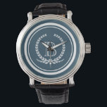 Monogrammdesign Armbanduhr<br><div class="desc">Monogramm-Design mit Laurel-Kranz-Dekoration in gestreifter,  runder Form auf blauem Hintergrund</div>