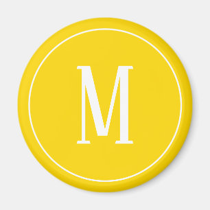 Monogramme blanc sur aimant rond jaune or
