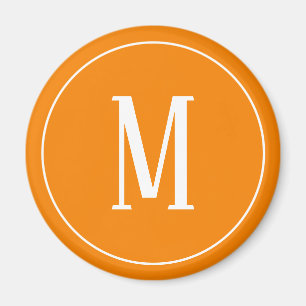 Monogramme blanc sur aimant rond orange