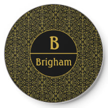 Monogramme de fibres noires et or